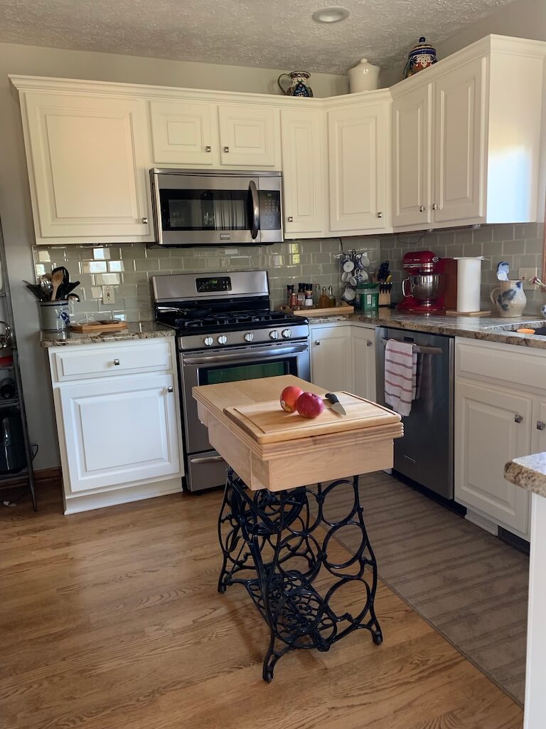 kitchen cabinets and wine table island